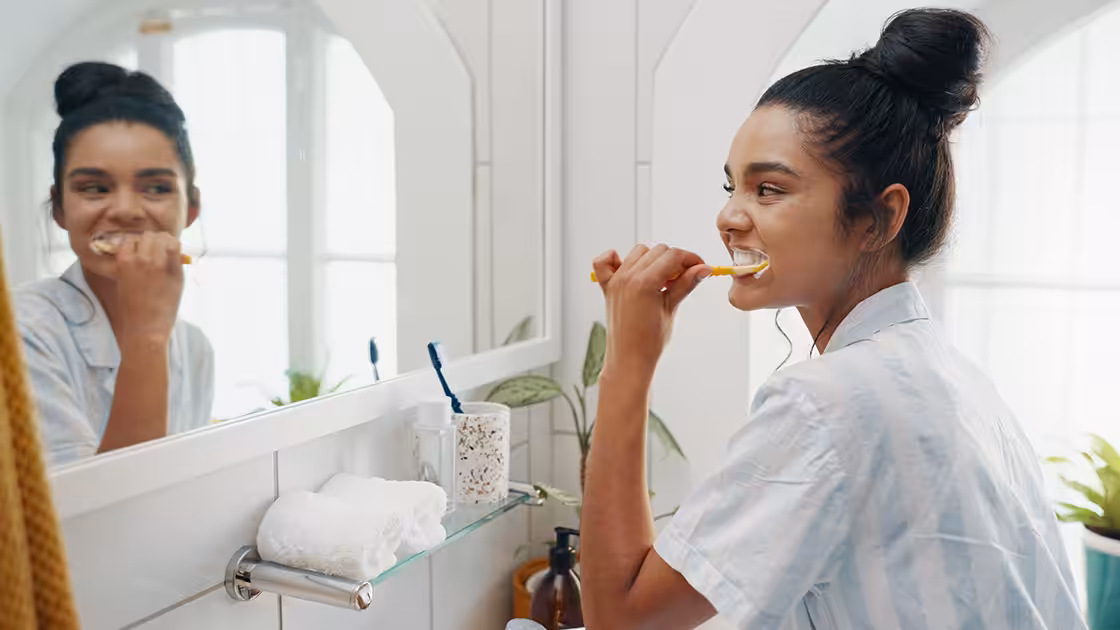 Oral health brushing in mirror